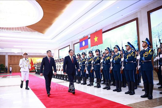 Thủ tướng Lê Minh Hưng chủ trì lễ đón chính thức Thủ tướng Lào Sonexay Siphandone